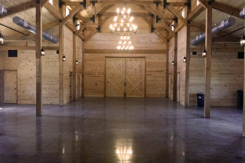 windy hill wedding and event barn interior empty with polished floor